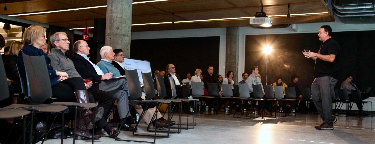 People gathered for a UC Venture Lab graduation. 