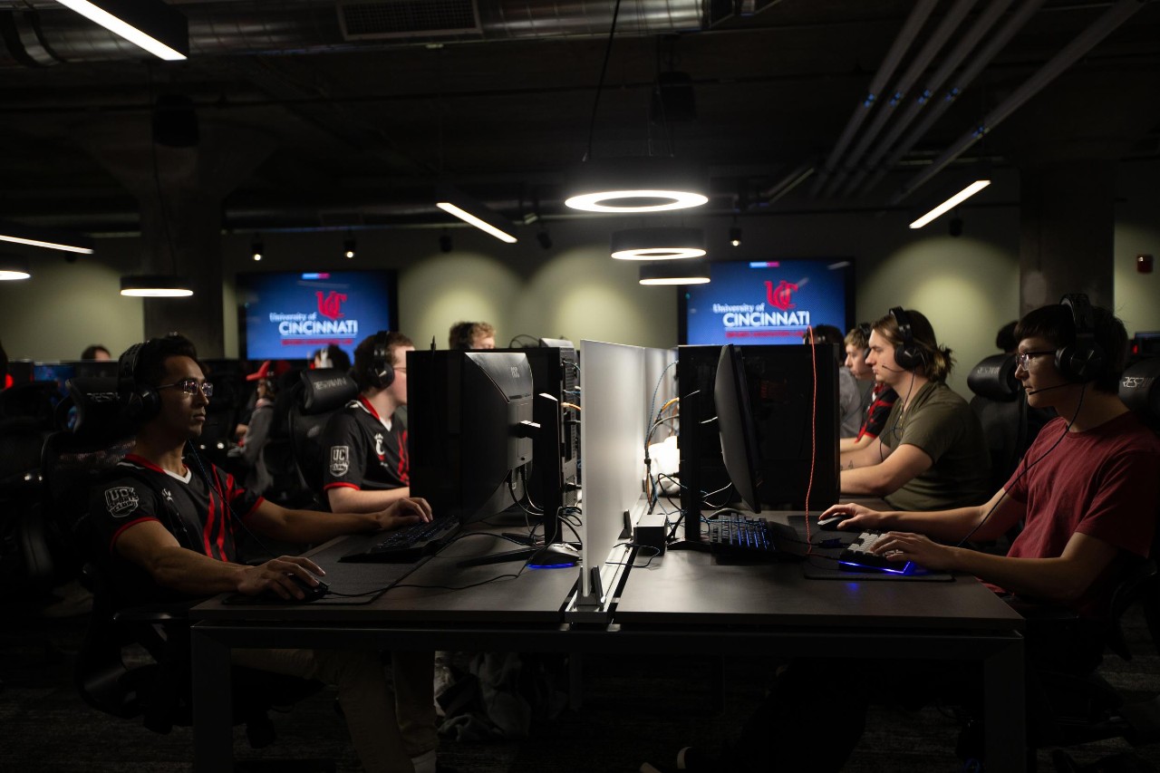 Students sitting at computers inside the UC Esports Lab