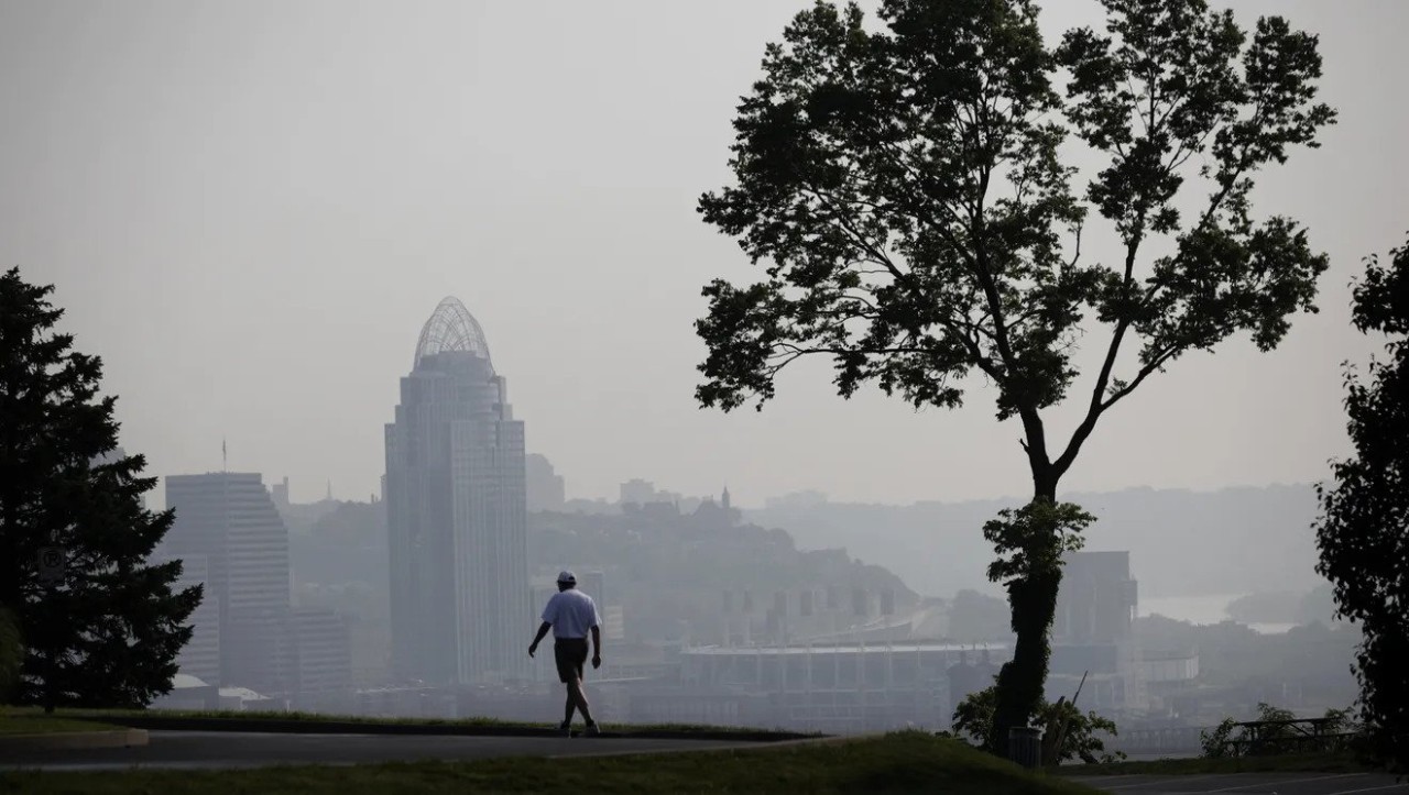 a view of the Cincinnati skyline on a smoggy day