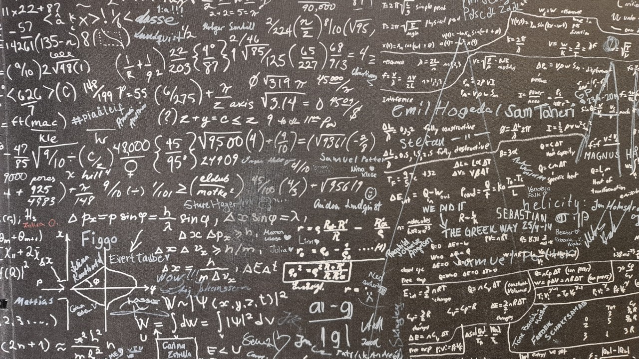 Mathematical equations on a blackboard.