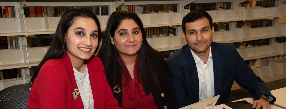 Zainub, Fatima and Hamza Rauf in the UC Blue Ash Library