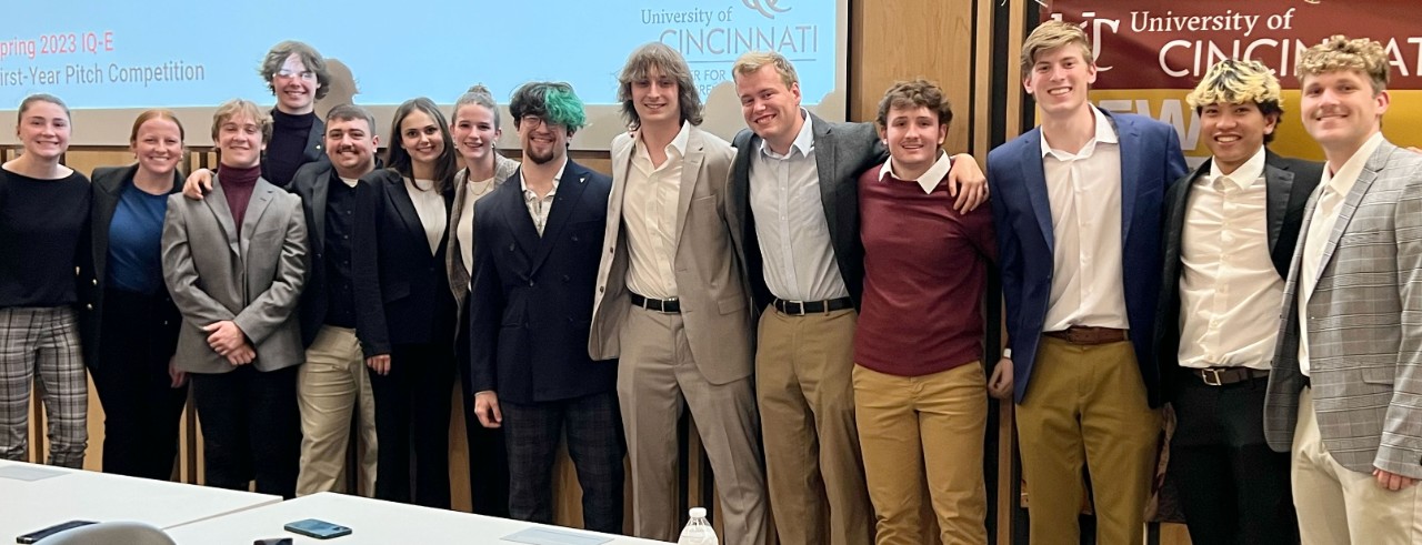 Students competing in the IQ-E event pose at the front of a classroom in Lindner Hall