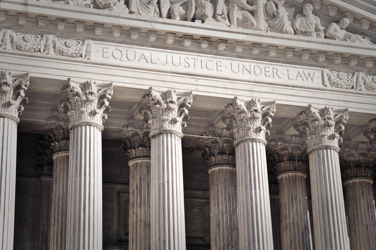 Close up of engraving above the entrance to the Supreme Court