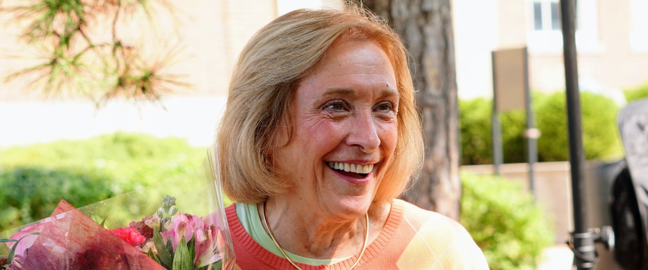 Bourke accepts plaque for scholarship in her namesake.