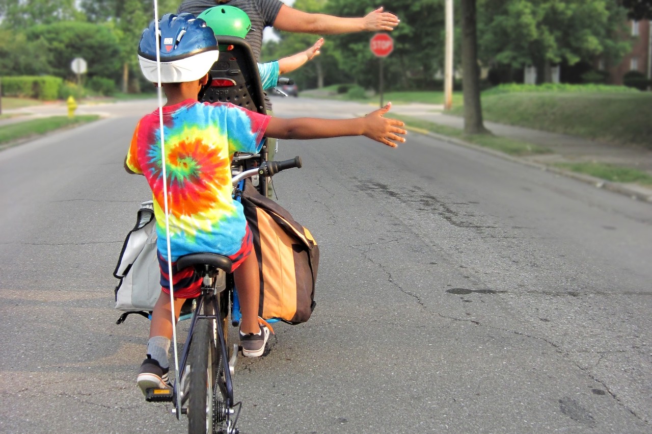 children cycling to school on bikes