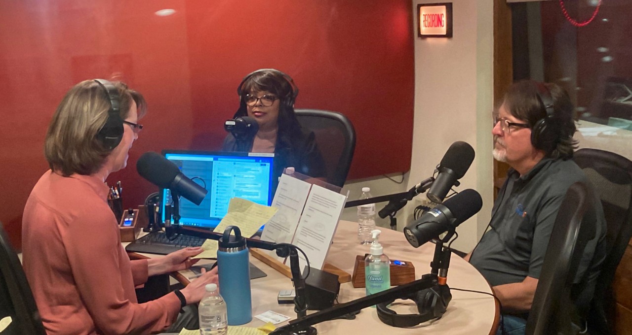 WVXU host Lucy May interviews UC Assistant Professor Latonya Jackson and Dave Hatter in a studio.