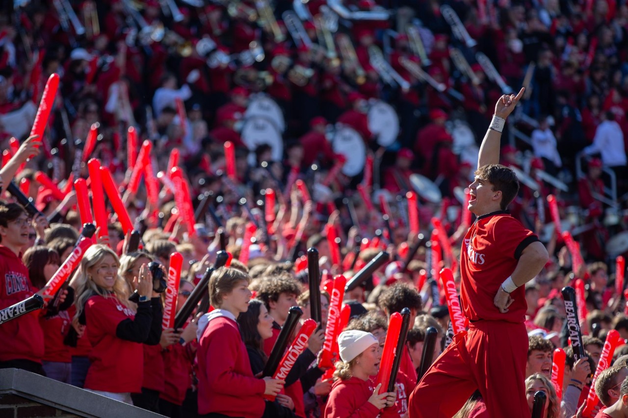 Students cheer at a football game