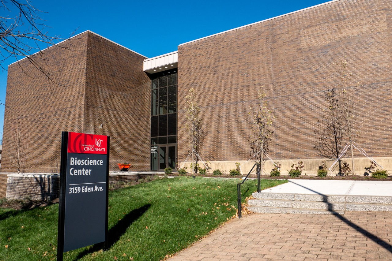 A sign for the Bioscience Center sits outside the brick exterior.