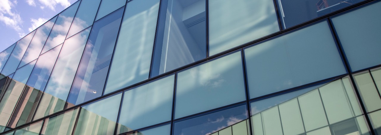 Glass windows in a Lindner Hall courtyard