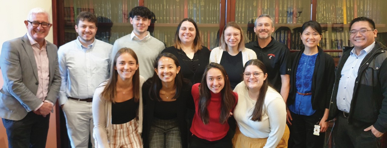 UC Pharmacy students pose with faculty leader Michael Doherty and Australian partners for a group photo.