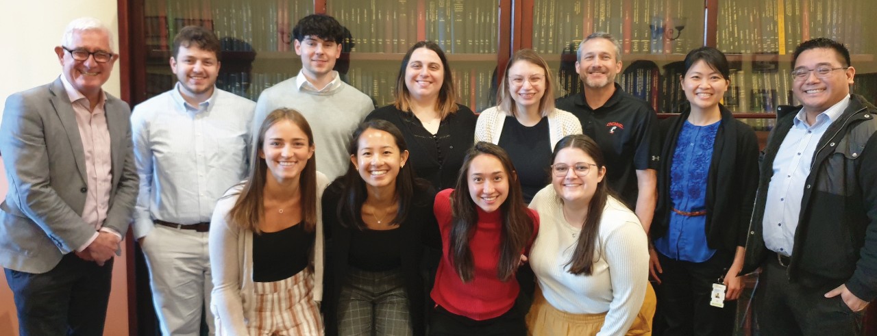 UC Pharmacy students pose with faculty leader Michael Doherty and Australian partners for a group photo. 