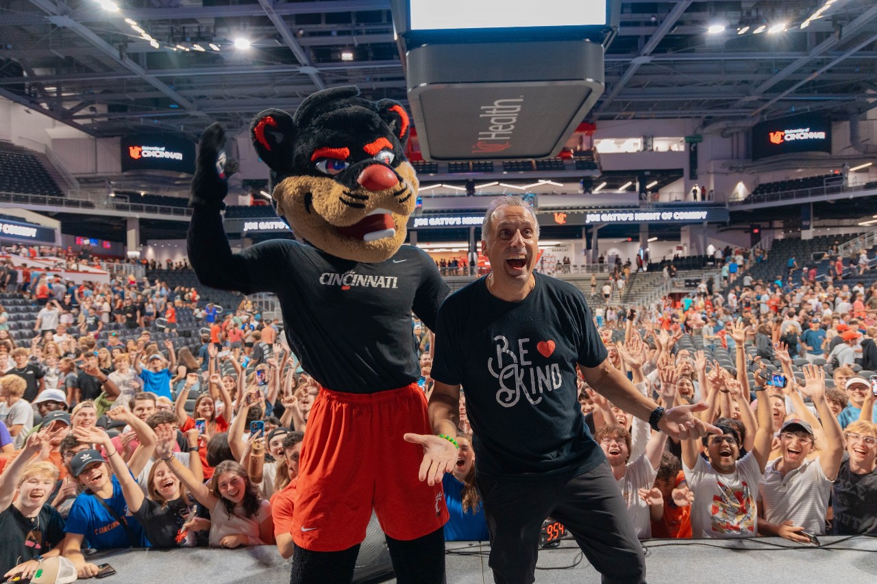 Comedian Joe Gatto shown with UC Bearcat mascot