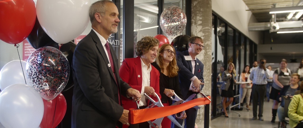Distinguished UC speakers during the ribbon cutting at the Warren Bennis Leadership Institute, left to right, Valerio Ferme, Marianne Lewis, Donna Chrobot-Mason, and Ryan Hays.