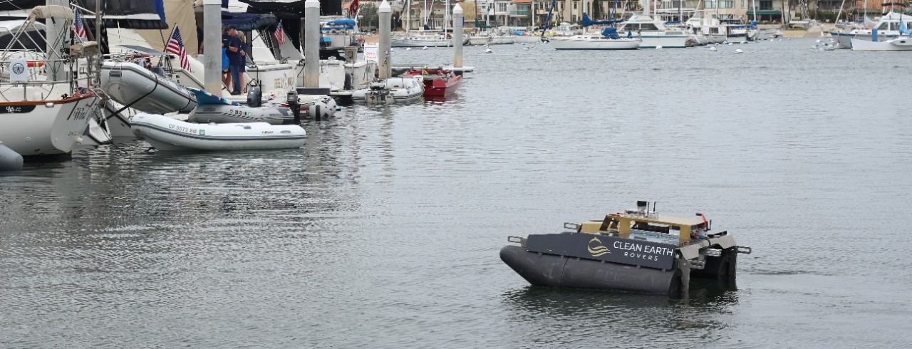 Clean Earth Rovers' rover in a marina