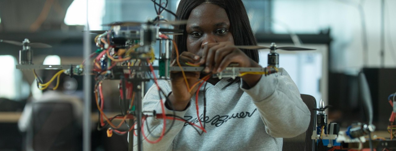 A student works on a drone in UC Digital Futures.