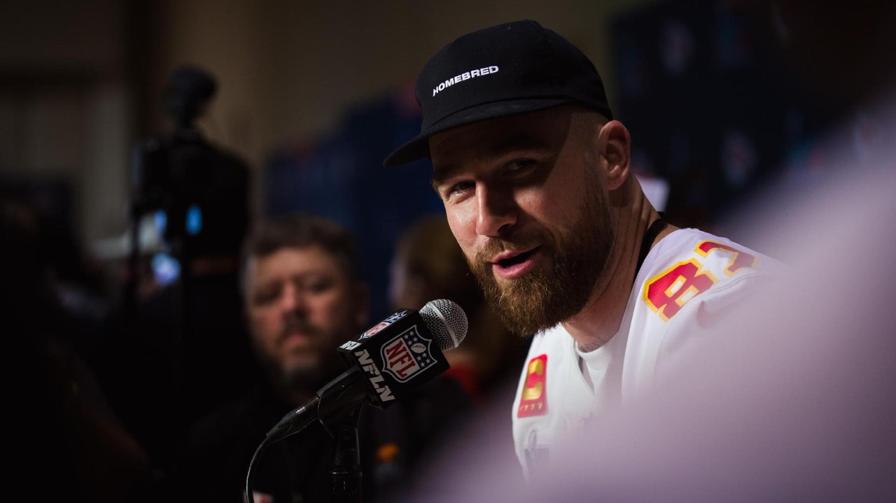 Travis Kelce speaking into NFL mic