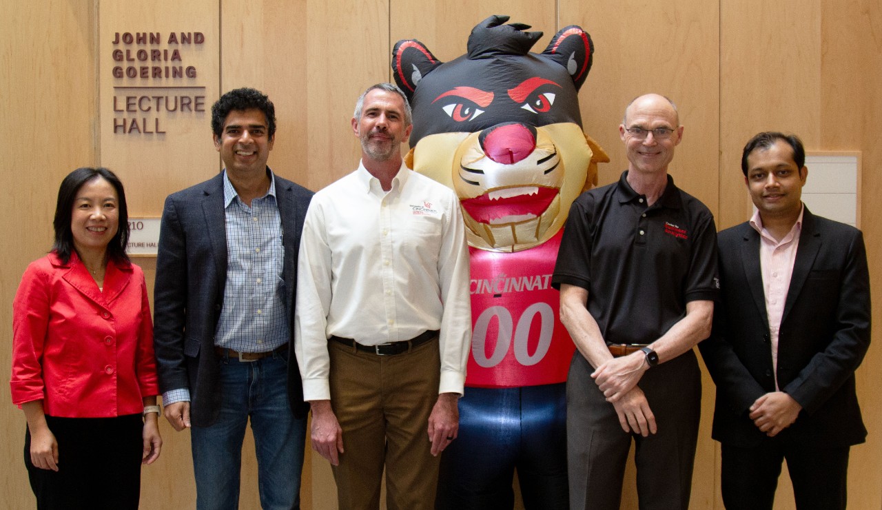 UC Center for Business Analytics staff members with the three keynote speakers from Data Science Symposium 2023.