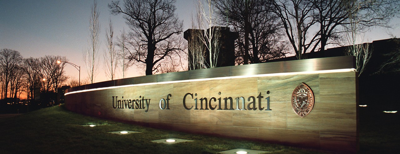 University of Cincinnati sign near the Martin Luther King Drive entrance at Uptown West campus.