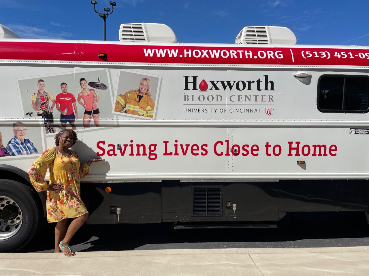 Carla Howard in front of Hoxworth donor bus