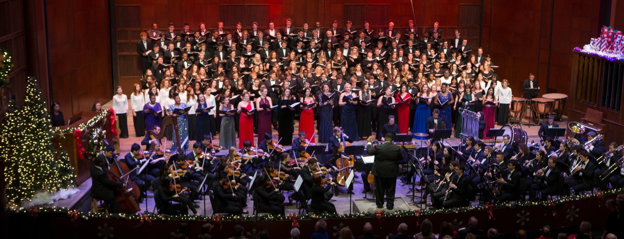 CCM's combined choirs and orchestra perform on the stage of Corbett Auditorium during a performance of Feast of Carols.