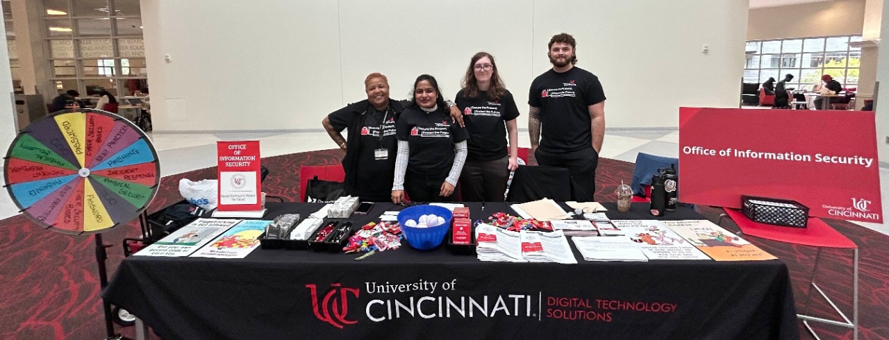 Picture of the University of Cincinnati information security team at a cybersecurity awareness event.