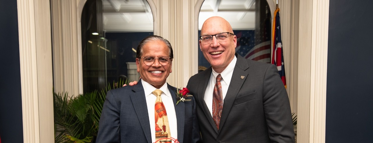 UC alumnus Vic Kulkarni and CEAS Dean John Weidner pose at the alumni awards