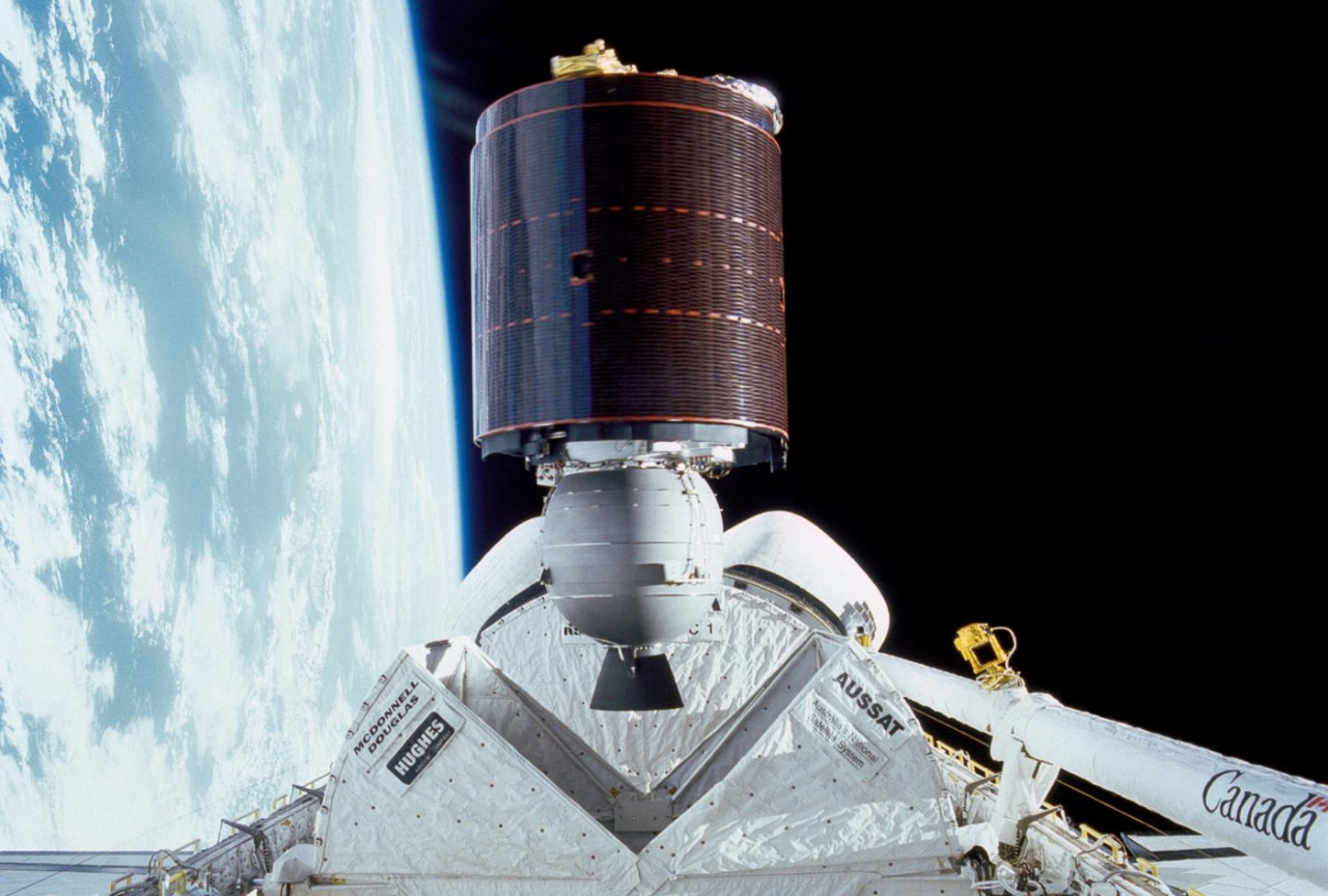 NASA deploys a satellite from the space shuttle Discovery.