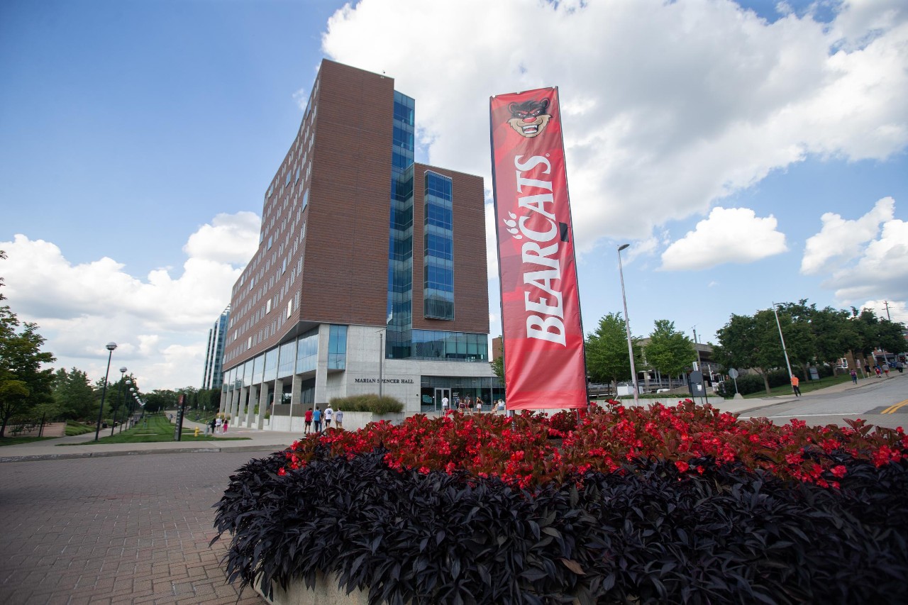 A Welcome Bearcats sign greets families outside Marian Spencer Hall at the University of Cincinnati for student move-in day.