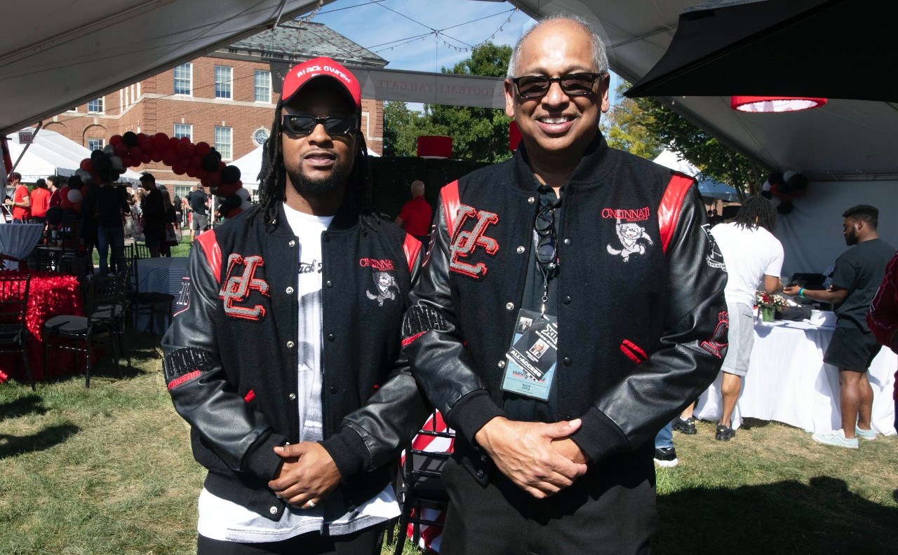 President Pinto and Means Cameron in Blackowned varsity jackets