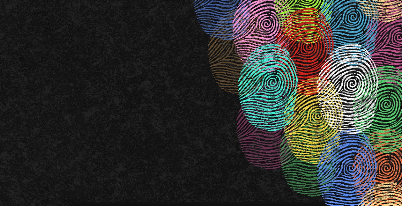 Multicolored fingerprints on a textured black background