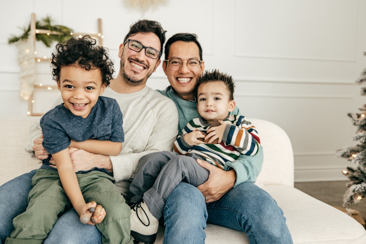 LGBTQ couple enjoying family time with their children