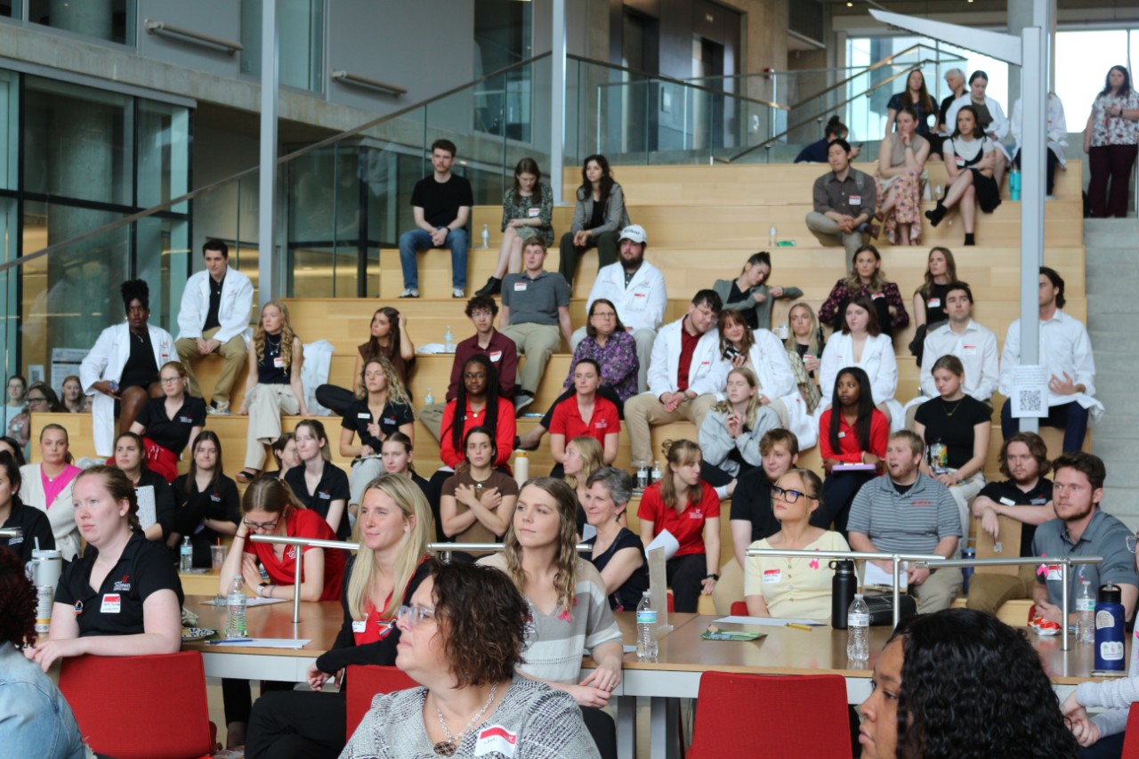 The HSB Atrium filled with people during the CAHS Scholarly Showcase