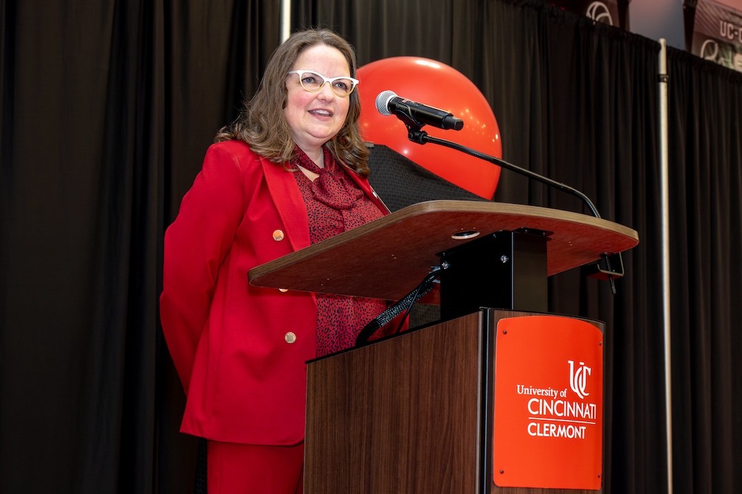 UC Clermont 2024 Distinguished Alumnus Michele Wells Walker speaks at the college's annual Partnership and Scholarship Luncheon on March 28. 