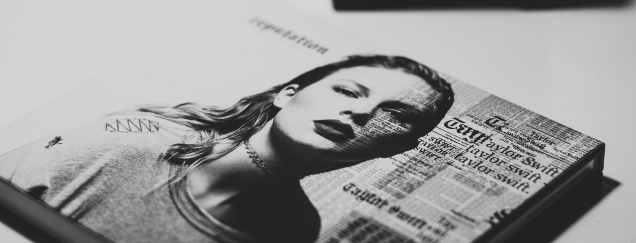 headshot of Taylor Swift on newsprint