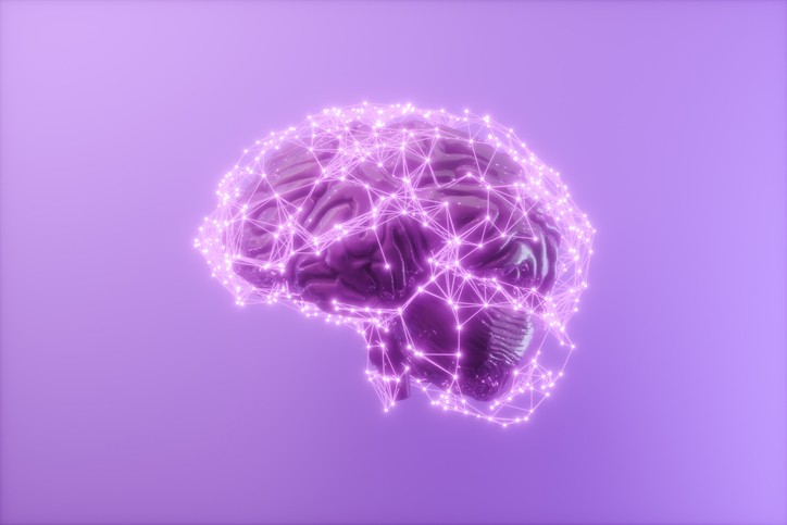 An illustration of a purple brain with neuron connections on a purple background