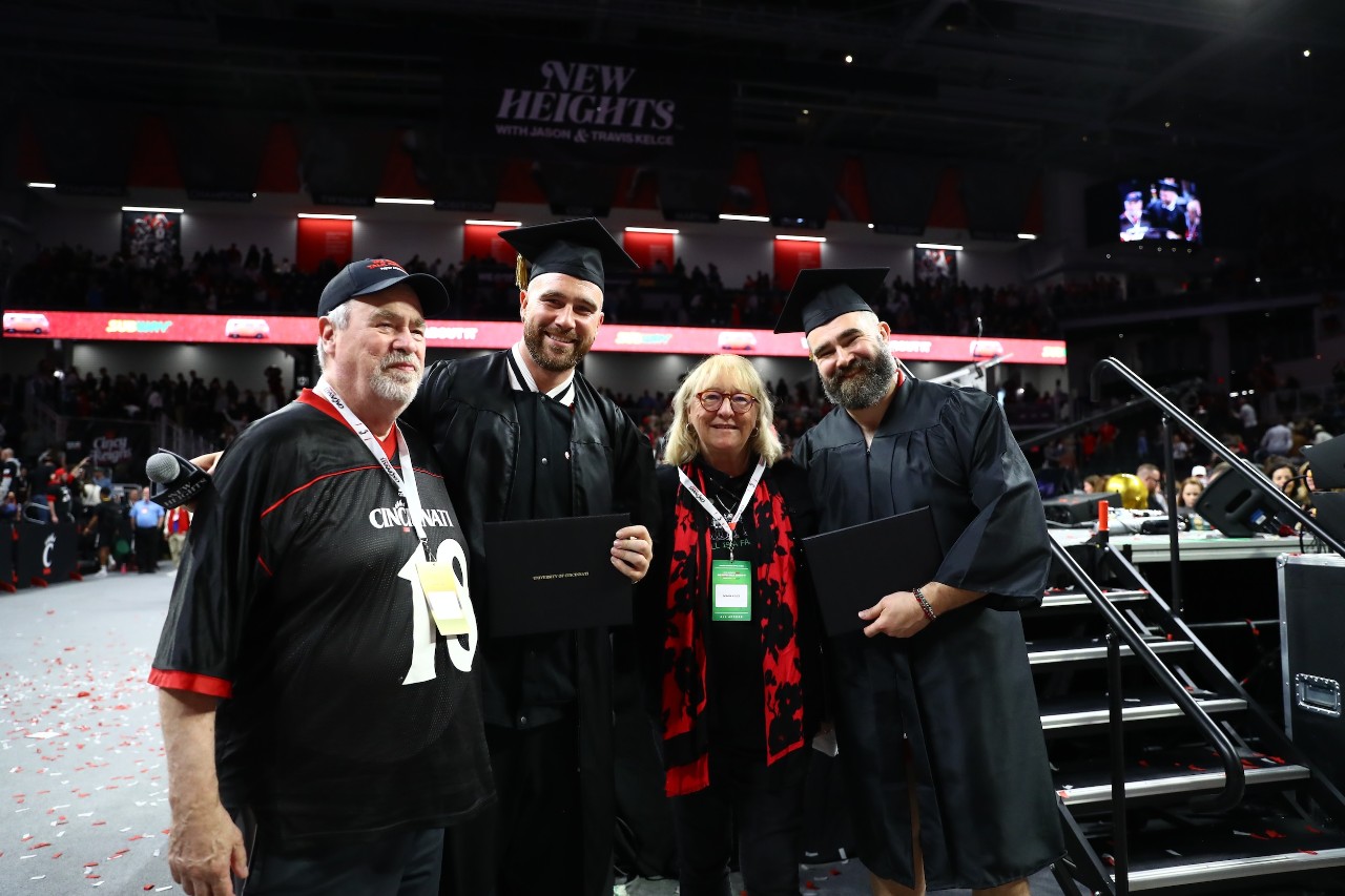 Jason and Travis Kelce onstage at New Heights Live