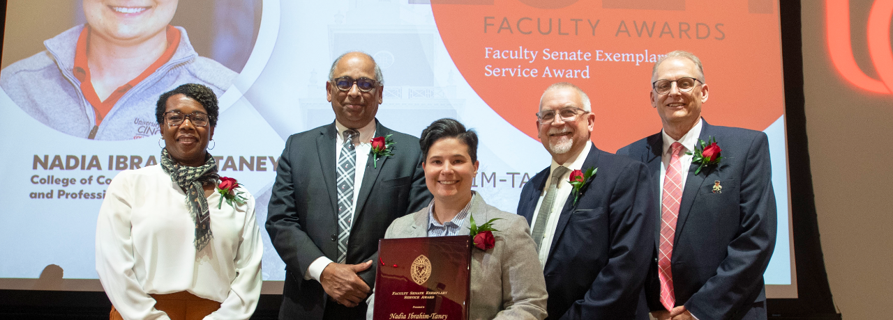 Nadia Ibrahim-Taney on stage at 2024 Faculty Awards ceremony