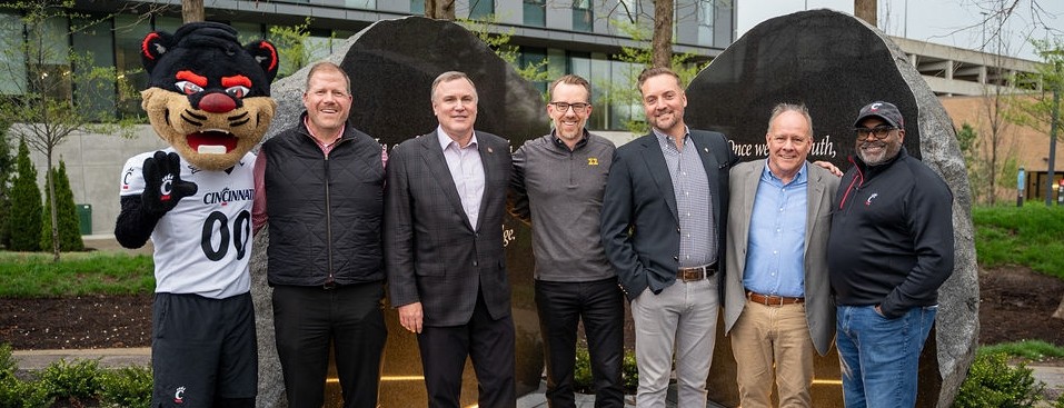 Six Sigma Sigma members with the Bearcat. 