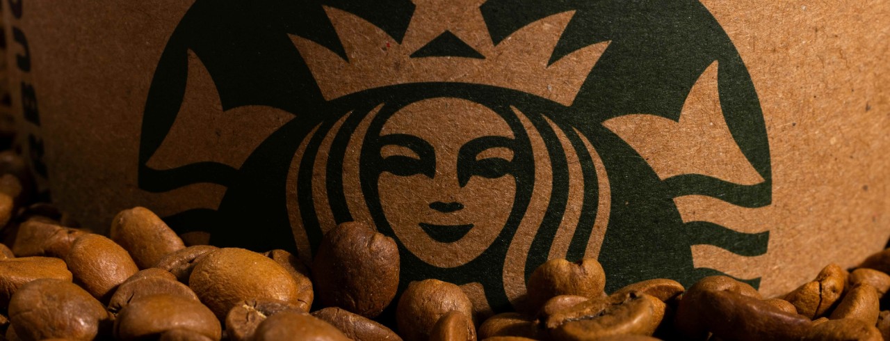 Starbucks logo and coffee beans.