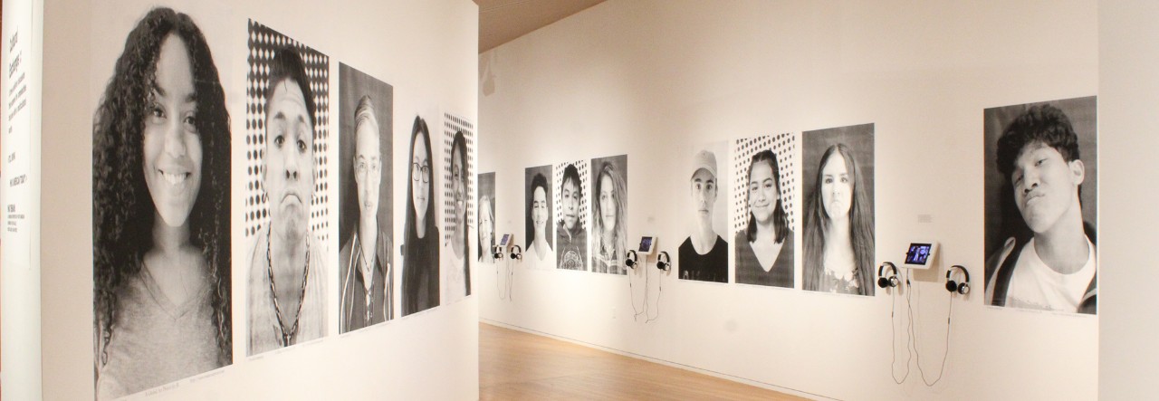 photo exhibit of different faces with different ethnicity