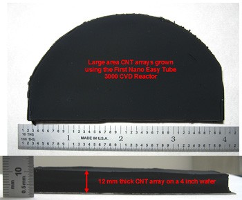 Optical images of a 12-mm-thick carpet of aligned CNTs grown on a 4-inch wafer. These samples prove that scaling up of the growth process of super-long carbon nanotube arrays on large area substrates is possible.