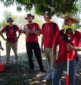 Andrew Schriner, John Moor, Neil Schaner and Kevin Klueber survey the community for the water distribution system.