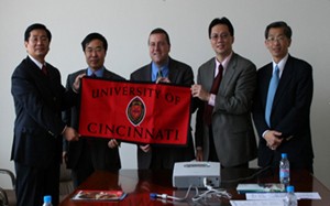 From left to right: SJTU's Guang Meng and Lifeng Xi; UC's Frank M. Gerner, Teik C. Lim and Jay Lee.