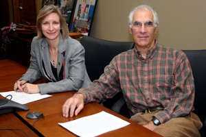 Photo of Dean Valerie Gray Hardcastle and Professor Daniel Langmeyer.