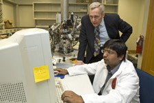 Professor Emeritus William Vanooij and student Prasan Harakuni.