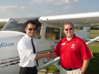 Khoa Nguyen (left) with instructor Mike Lack immediately following his Recreational checkride.
