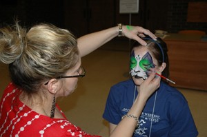 Archive photo of face painting from previous sampler weekend at UC Clermont College. 