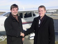 Rick Rohrig (left) with instructor Colin O'Rourke immediately following his solo flight.