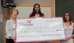 Jennifer Ebelhar, VP Development Free Store Food Bank (L) Laura Baker (middle) Kortney Wykoff (rt)