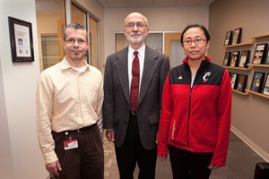 Giovanni M. Pauletti, Andrew J. Steckl, and Hua Li, graduate student with Drs. Pauletti and Steckl. 